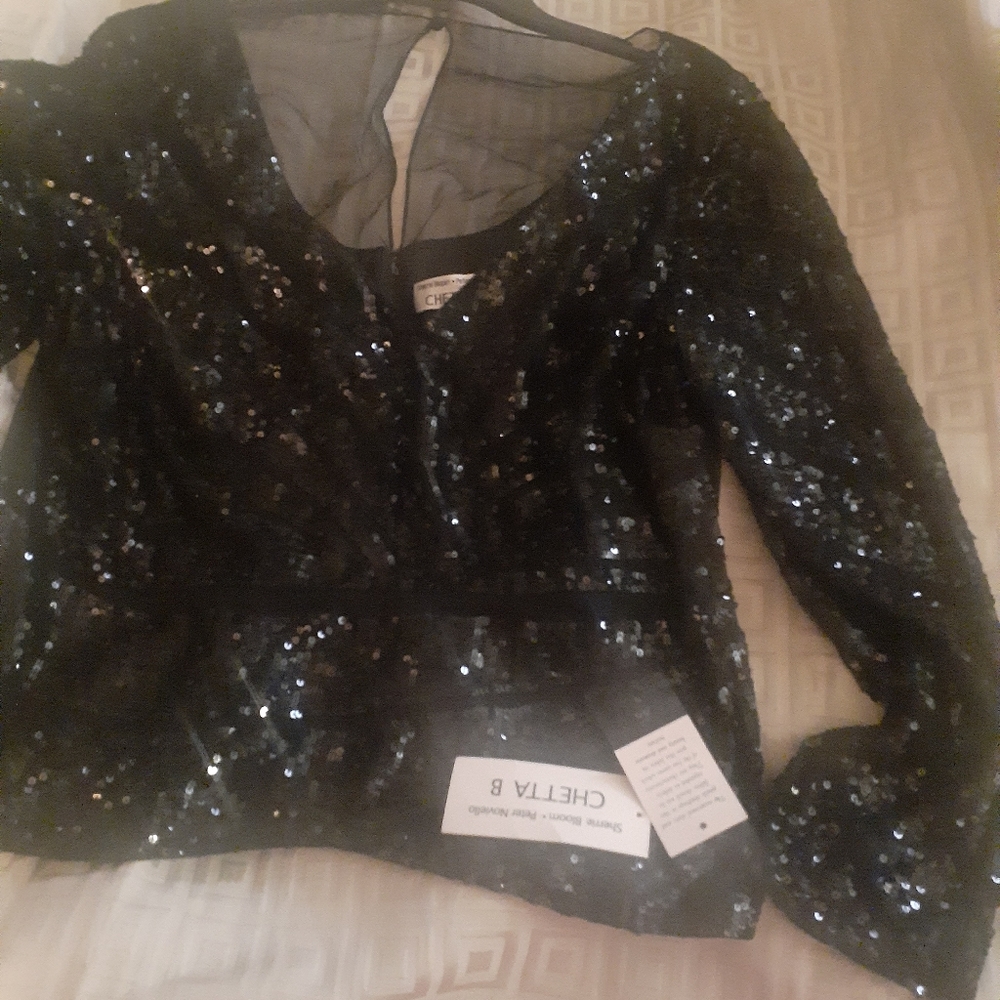 Beautiful new  sequined blouse